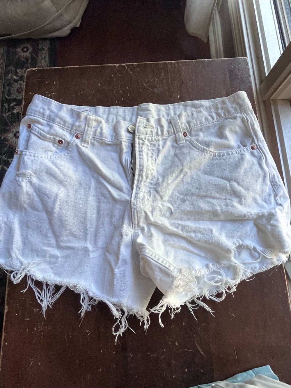GAP 4” low rise stride short. Women’s White Distressed Denim Shorts